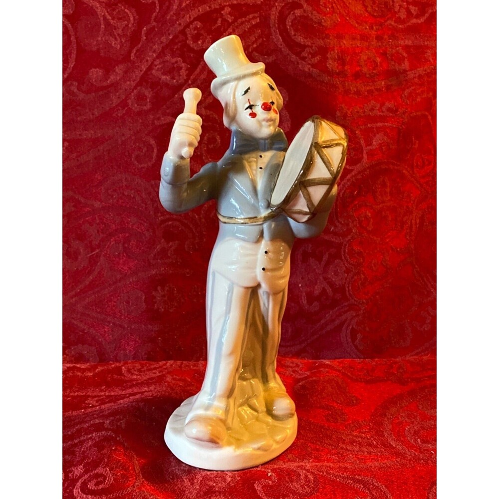 Unmarked lladro like ceramic clown with drum